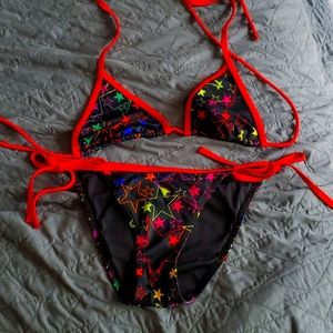 Black bikini with colorful star print.